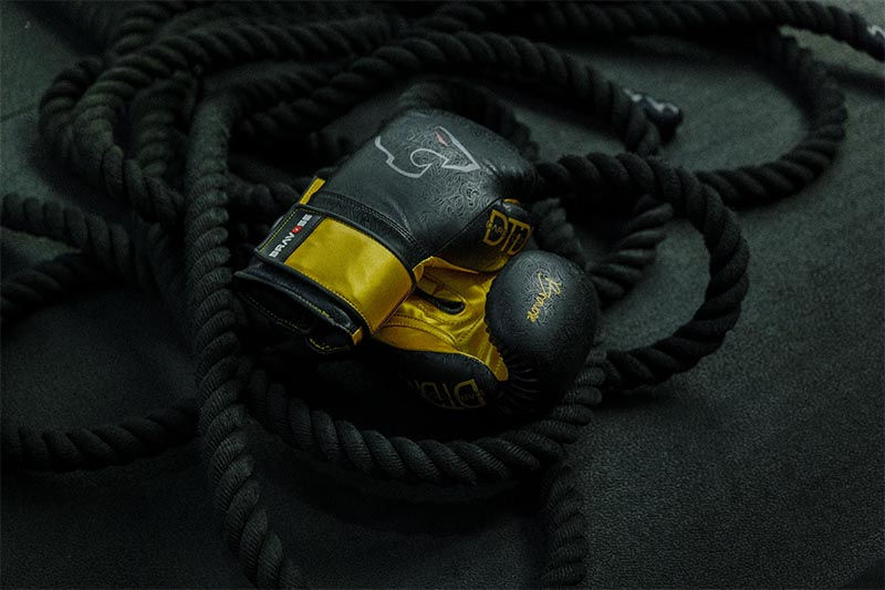 Thumbnail: Bravose Nemesis Black Gold Boxing Gloves