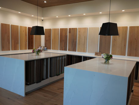 White showroom countertops holding product samples