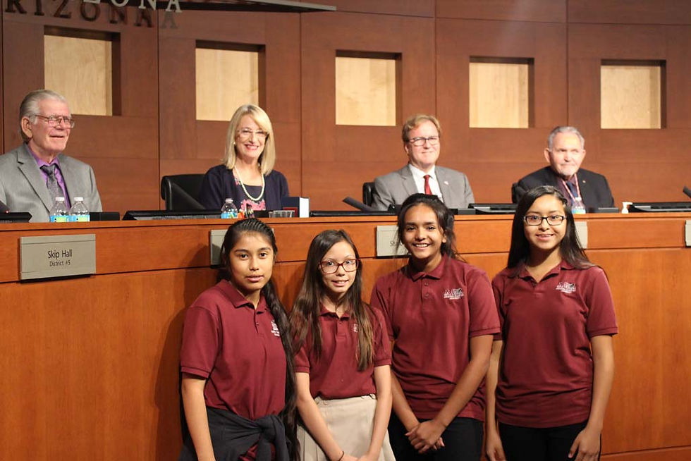 Middle School students pose with City of Surprise Council