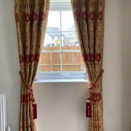 rich red and gold patterned curtains