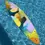 Thumbnail: Colorful surfboard with abstract artwork hand made by Kelly Becker for a tropical inspired surf art piece