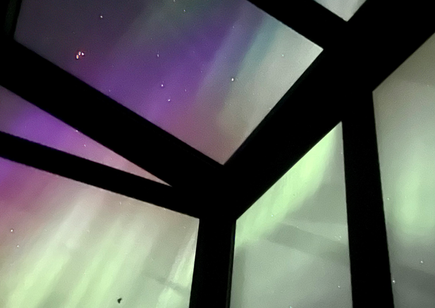 Northern lights from glass cabin in Selfoss, Iceland