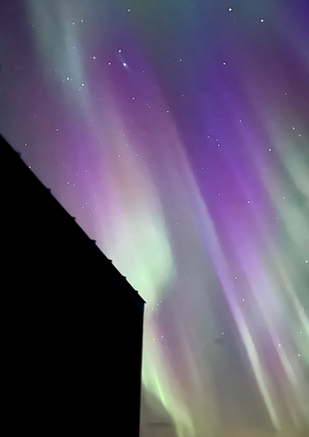 Northern lights from glass cabin in Selfoss, Iceland