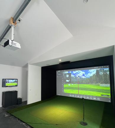 golf simulator installation by Golfsim Australia with pitched ceiling, full-size impact screen and Uneekor launch monitor