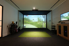 Luxury home golf simulator installation in Melbourne featuring GSPro projection screen, putting turf, and sleek built-in cabinetry — designed by Golfsim Australia.