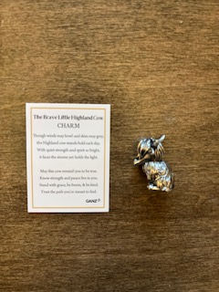 The brave little highland cow charm