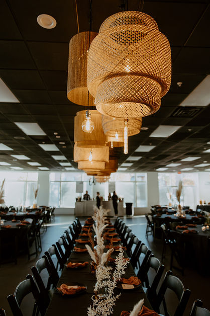 Dark boho table setting and decor at The Vail Wichita KS wedding venue