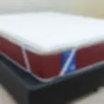 Full view of a white 5cm Super Elastic High Density Mattress Topper featuring a soft quilted surface and  corner straps