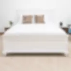 White CATANIA Bedset frame with side tables in a bright bedroom.