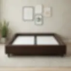 KNOCKDOWN Divan base in a dark finish, shown without a mattress in a bedroom setting.