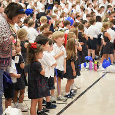 Student and teacher praying
