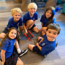 students work together to build a solar-powered car