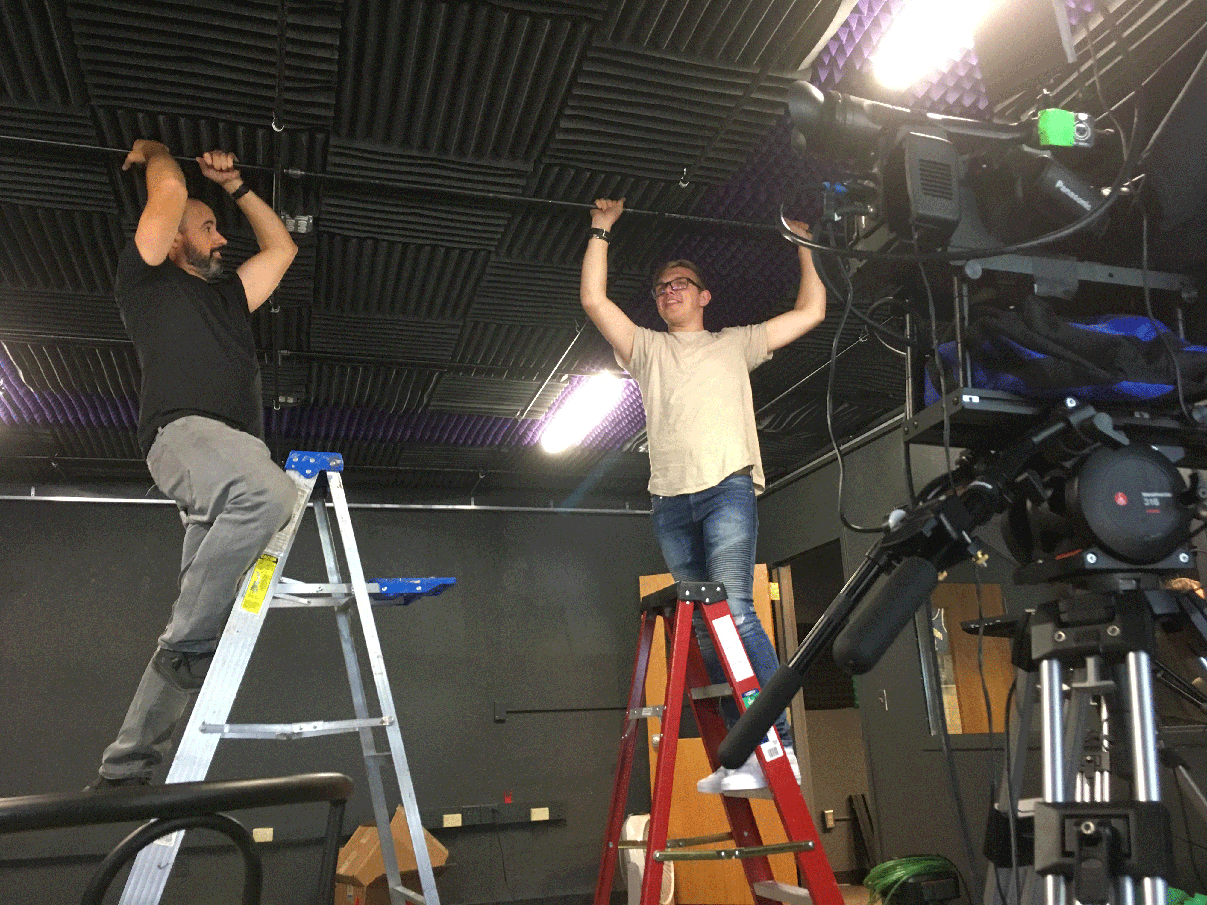 Roger-and-Dusty-hanging-lights.gif