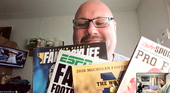 Fantasy Football Fanatics - Zach Schmidkunz displaying his Fantasy Football Magazines. He grinned and said, "there is a reason I'm 0-4".