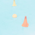 a group of orange and yellow cones sitti