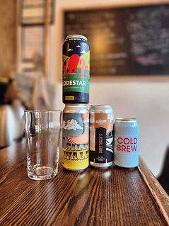 beers-in-cans-on-wood-bar.jpg