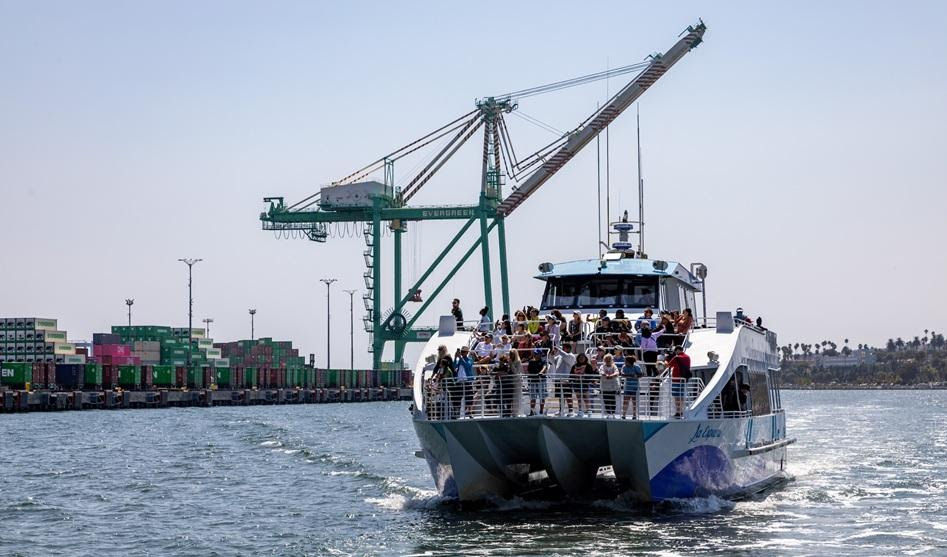 Image of a boat with people on it on the water.