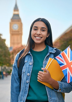 woman-wearing-denim-jacket-is-holding-yellow-folder-with-union-jack-uk-flag-it.jpg