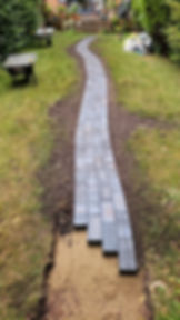 New garden pavement with bricks and tiles