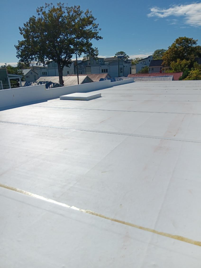 Roofing installation process showing structural preparation and step-by-step construction