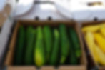 A box of green zucchini. 