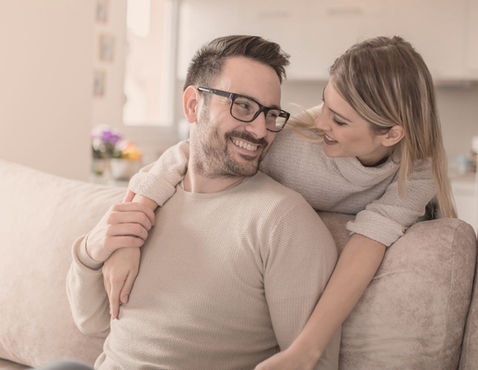 Couple holding hands, representing couples therapy