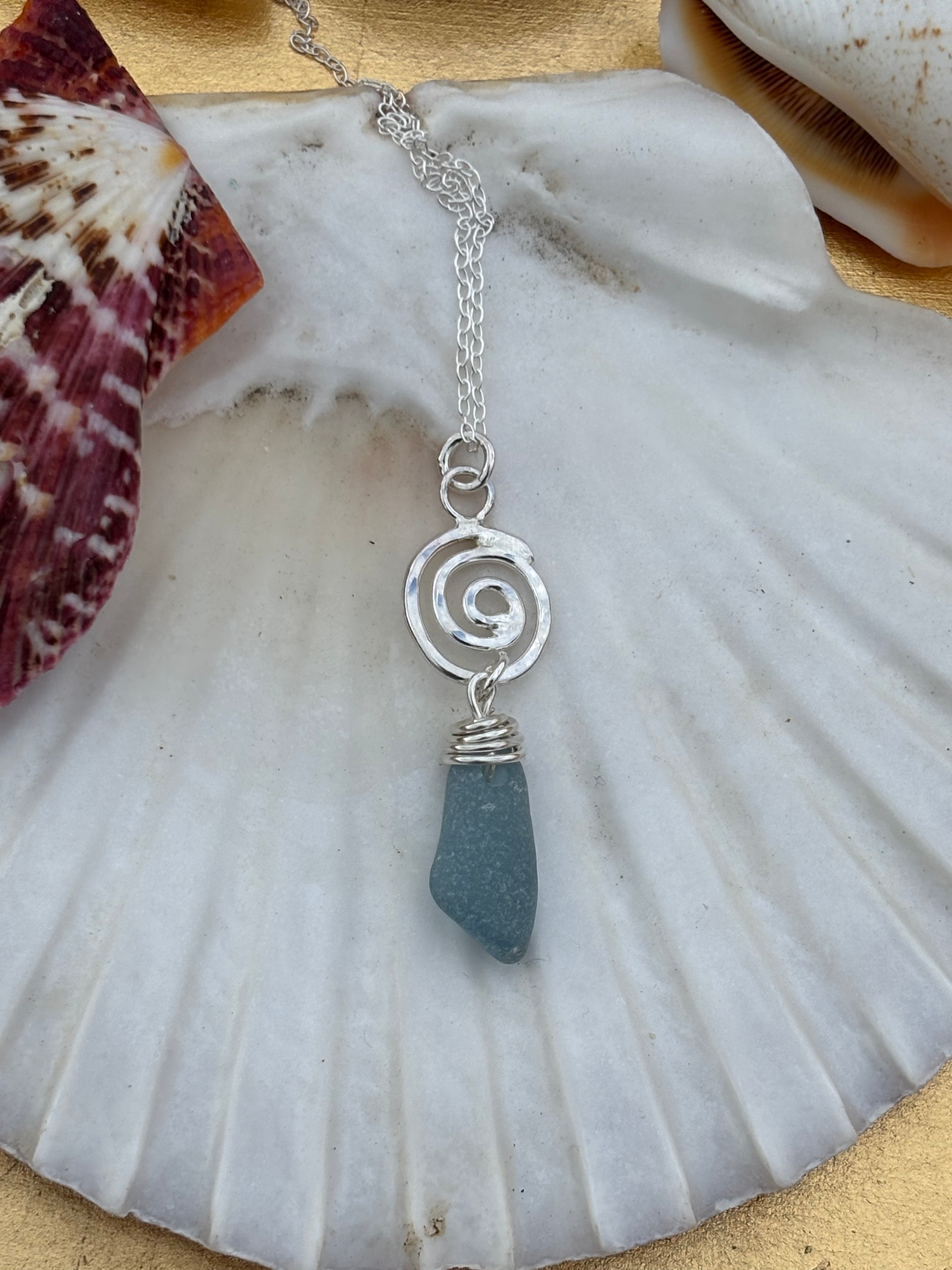 Pale blue sea glass spiral pendant 