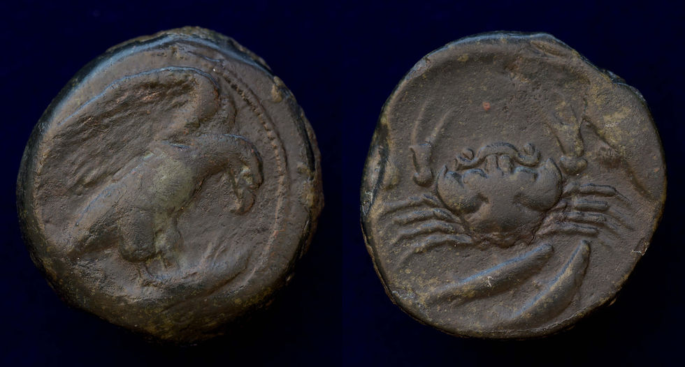 Sicily, Akragas Æ Hexas. Circa 425-406 BC. Eagle, with head lowered, standing right on fish; [AKPA] across fields / Crab, two fish below; two pellets on either side of crab. HGC 2, 148. 