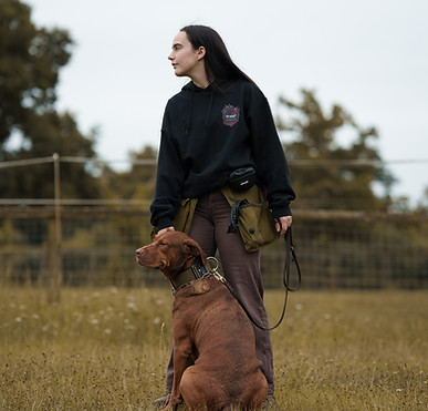 Woman standing with her dog