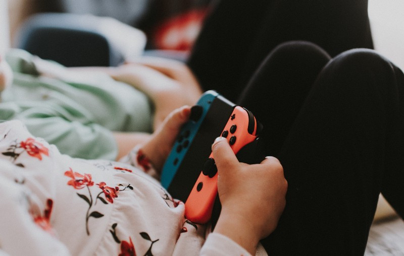 Girl holding Nintendo Switch