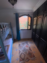 Habitación doble con baño en Arima Surf House.