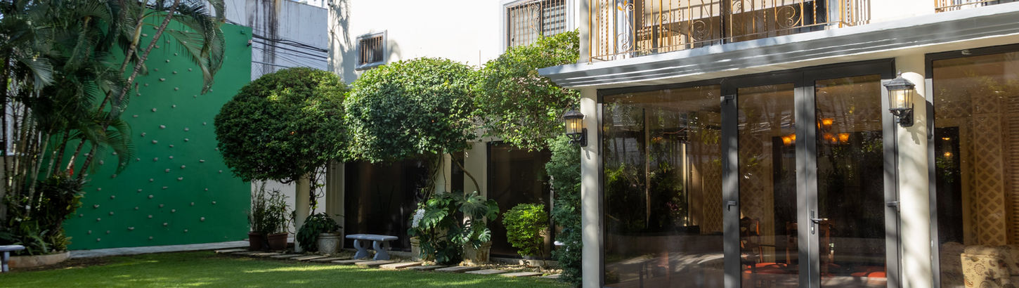 Rental house backyard with pool and garden