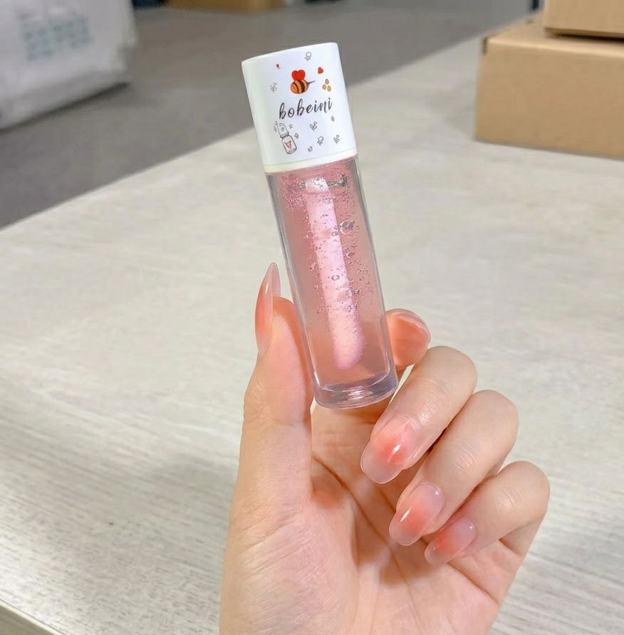 Thumbnail: First Skin Peach Honey Hydrating Lip Oil