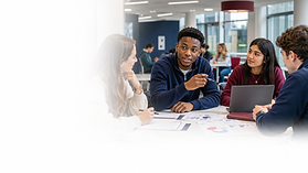 Students studying together in a university classroom