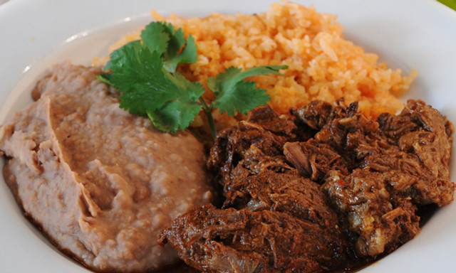 Beef birria with rice and beans