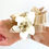 Thumbnail: White And Gold Wrist Corsage