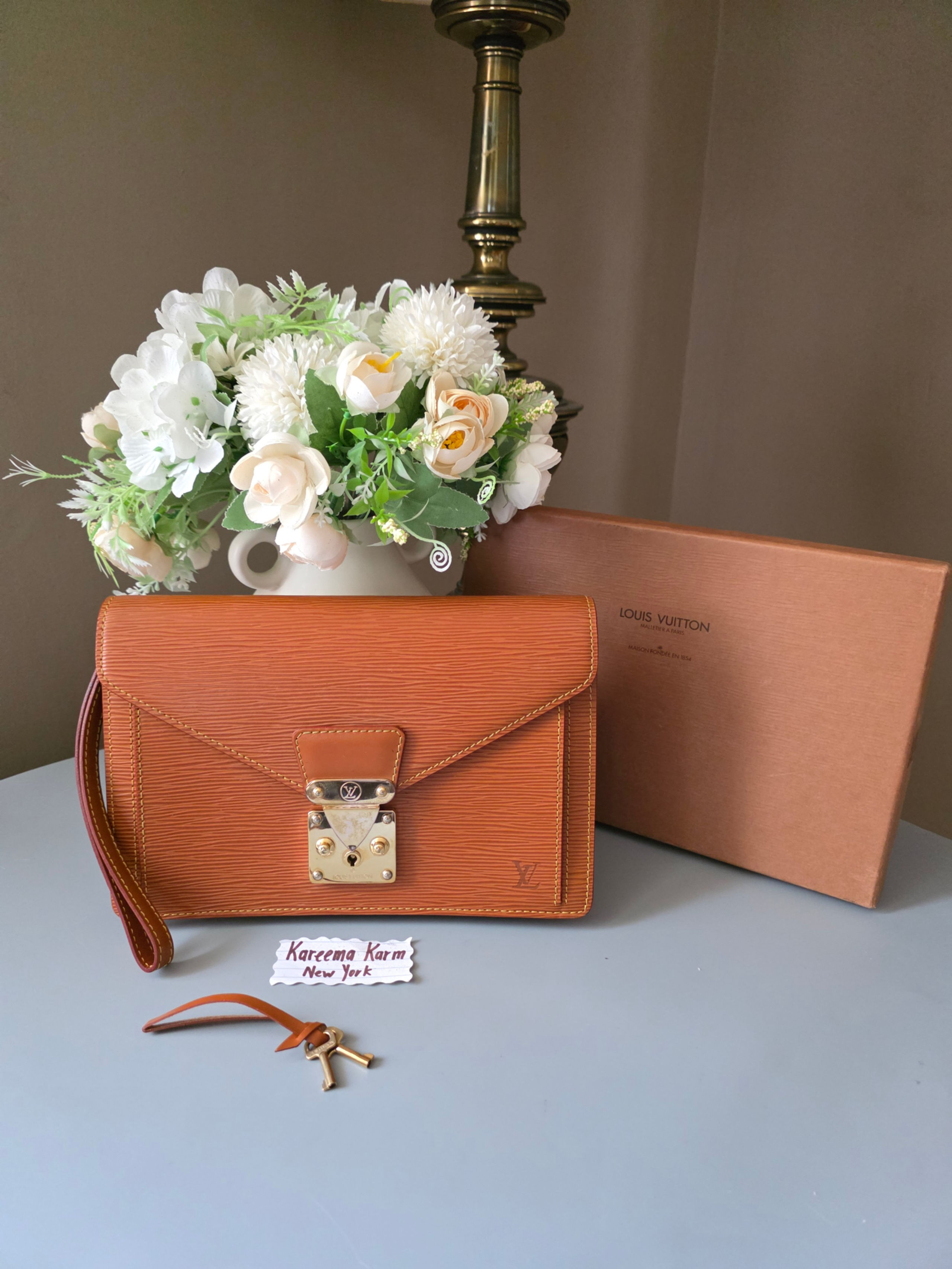 Authentic Epi Leather Dragonne Clutch