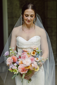 Bride and groom walking hand in hand after their ceremony