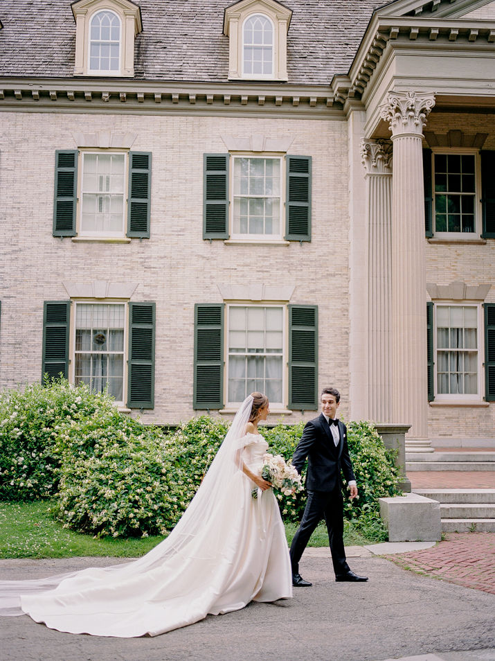 Bride and Groom during their first look at the George Eastman Museum in Rochester, New York, with beautiful classical architecture in the background.
