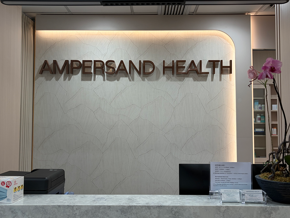 Ampersand Health reception area with branded sign