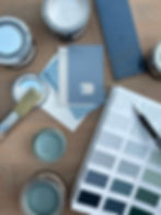 Materials board showcasing colour schemes for HMO design, featuring durable paints in neutral tones, wood finishes, and accent colours for a cohesive, functional aesthetic