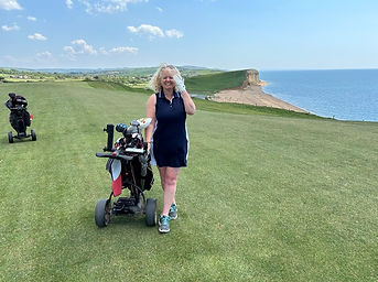 Golfer on the fairway at Bridport and West Golf Club, Dorset