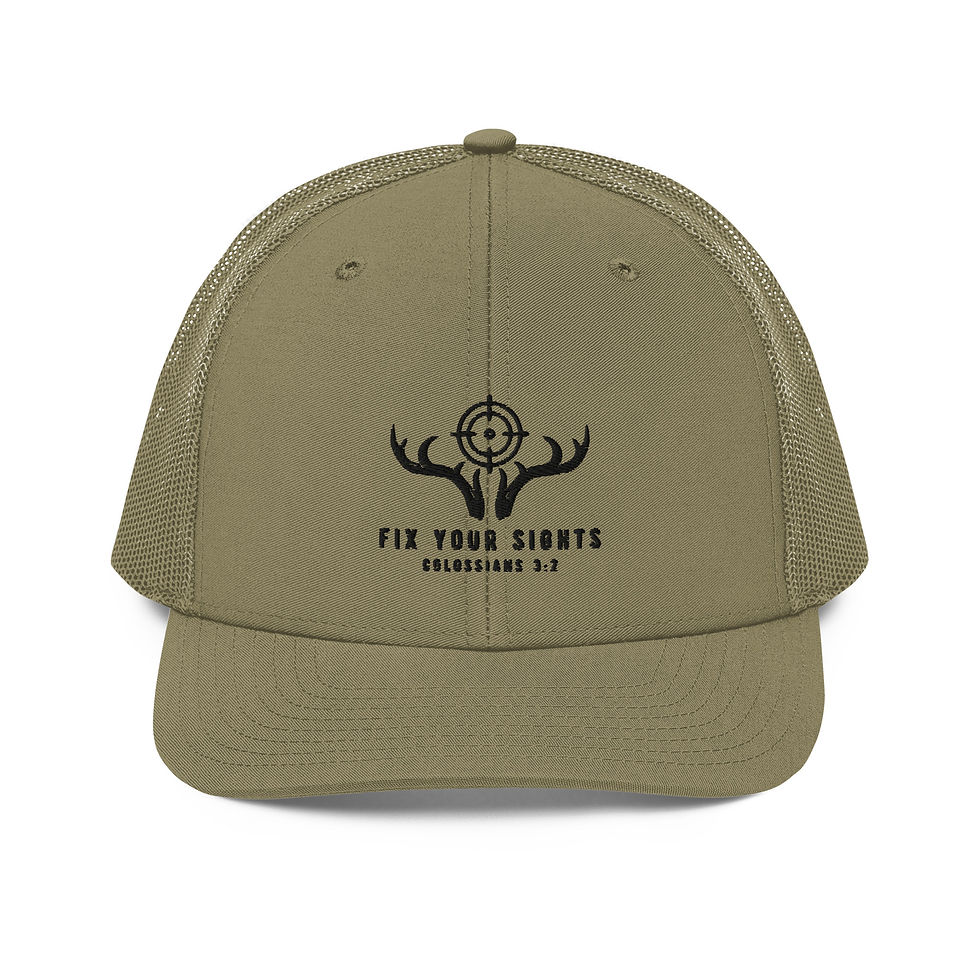 Eye-level view of a rugged camouflage hat with a Christian fish symbol embroidered