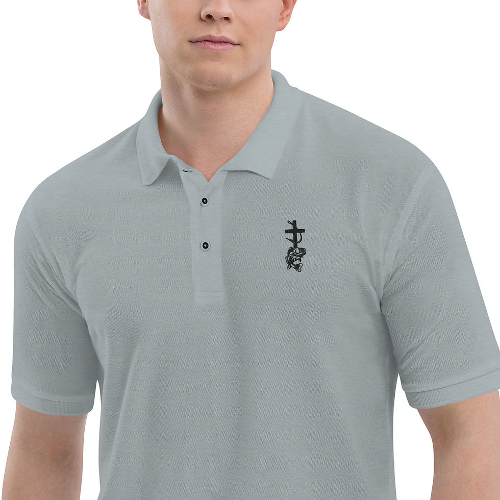 Man in light gray polo shirt with embroidered logo