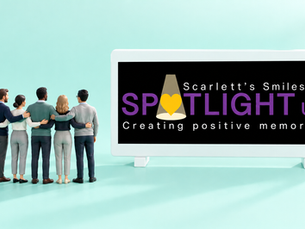 Colleagues standing with their arms around each other beside the Spotlight UK charity logo.