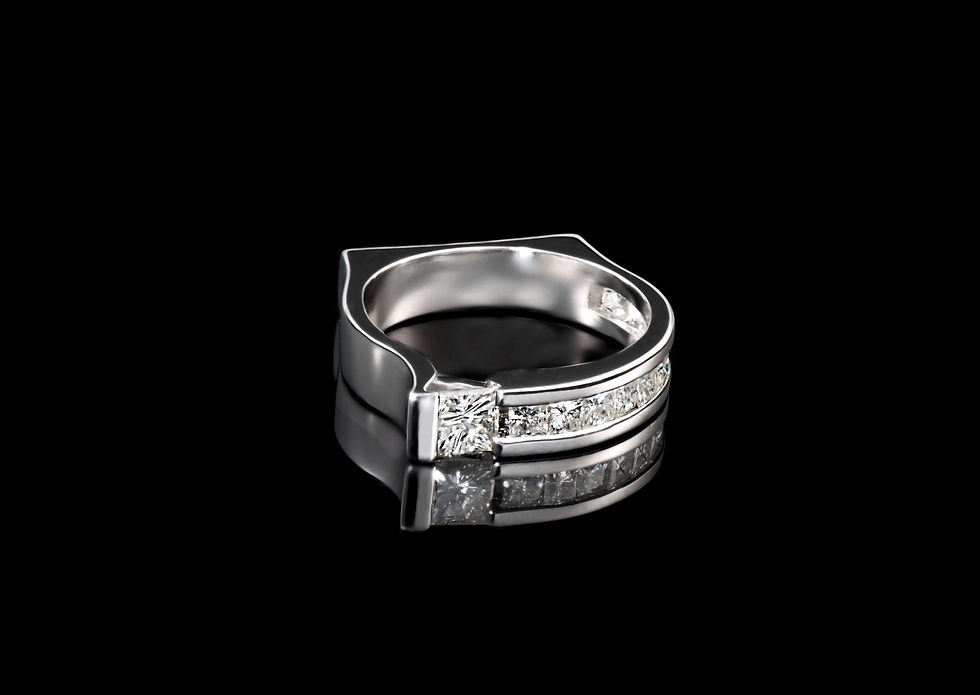 White gold princess cut diamond ring.