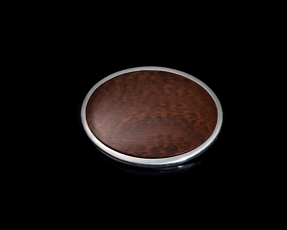 Oval snake wood brooch.