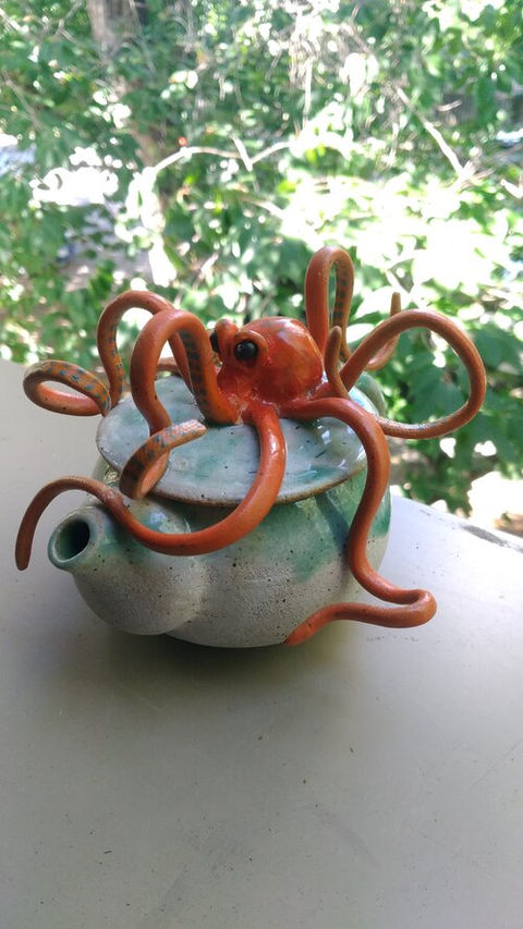 Paige's tea pot with an octopus crawling overtop it.