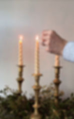 Lighting the spiral candles.