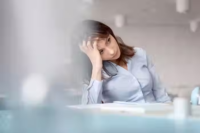 Frustrated leader tries to find the solution to her company's tension